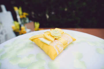yellow pillow for wedding rings