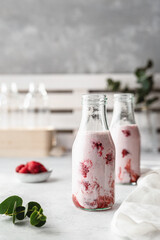 strawberry jam in a glass jar. Milkshake