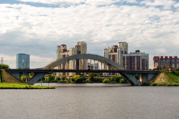 View of residential buildings in the city of Khimki and the railway bridge across the Moscow canal