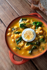 Traditional Spanish cuisine dish that is eaten mainly during the Holy Week holidays. Chickpea, cod, spinach and egg soup. Vigil Potaje.