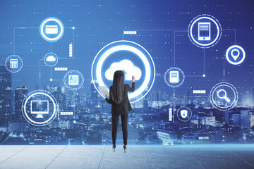 Data storage and cloud technologies concept with businesswoman writing on digital screen with cloud icons