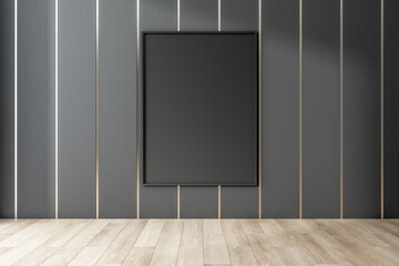 Blank black poster in an empty room, grey walls and wooden floor, advertising concept, mockup