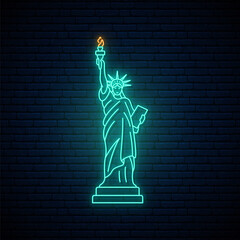 Neon Statue of Liberty, famous New York landmark. Glowing Statue of Liberty icon on brick wall background. Bright light signboard. Vector illustration. © greens87