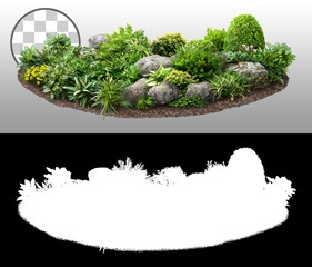 Cut out flowerbed. Plants and flowers isolated on transparent background via an alpha channel....