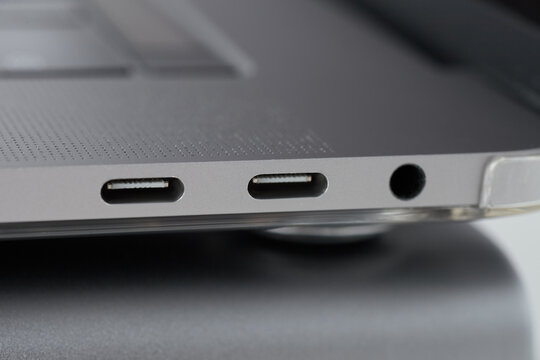 Close-up photo of laptop type-c ports and 3.5 jack.