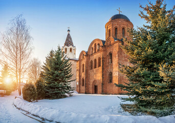 The Church of Peter and Paul and the Church of Varvara surrounded by green fir trees in Smolensk