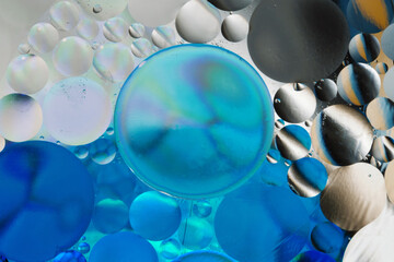 Abstract background with gradient of a blue and white colors, oil drops in water abstract bubbles...