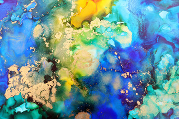 Fototapeta na wymiar art photography of abstract fluid art painting with alcohol ink, blue, green, yellow and gold colors