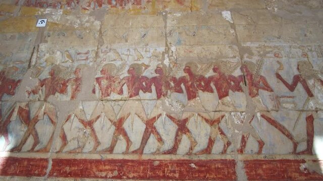 Mortuary Temple of Hatshepsut hieroglyphic color painting people and rice staple abundance of Egypt