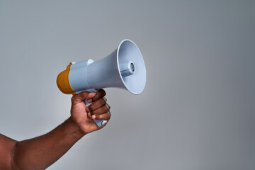 Megaphone held by african american person