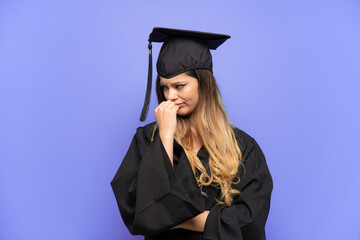 Young university graduate Russian girl isolated on white background having doubts