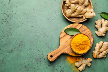 Composition with turmeric powder and roots on color background - obrazy, fototapety, plakaty