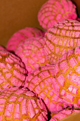 close up of pink Mexican bread 