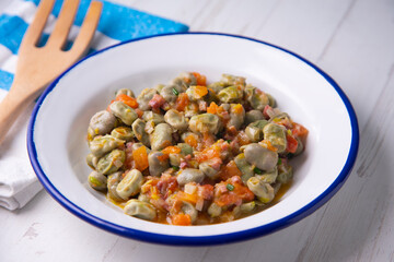 Menestra Tapa Stewed broad beans with tomato and ham