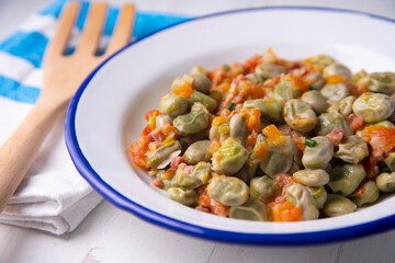 Menestra Tapa Stewed broad beans with tomato and ham