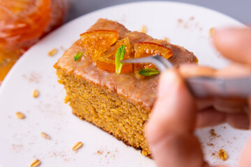 Vegan whole grain orange sponge cake with sugar glaze
