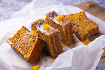 Vegan whole grain orange sponge cake with sugar glaze