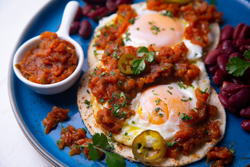 Huevos rancheros with red beans