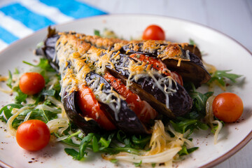 Hasselback Eggplant stuffed with tomato Italian style with cheese