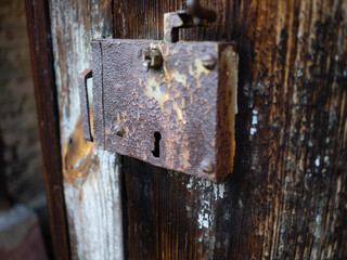 old lock on wooden door