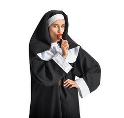 Sexy nun with lollipop on white background