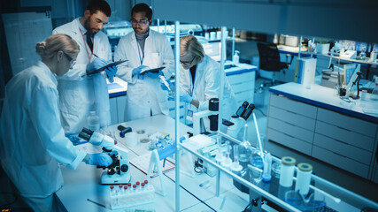 Team of Medical Research Scientists Have Meeting and Conduct Experiments with Help of DNA Samples...