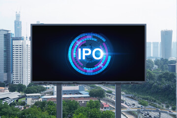 IPO icon hologram on road billboard over day time panorama city view of Kuala Lumpur. KL is the hub...