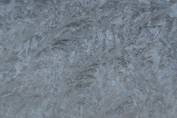 Ice texture background. Frozen window on a winter night. 