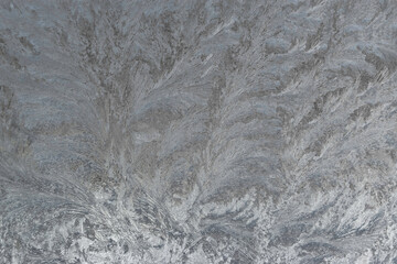 Ice texture background. Frozen window on a winter night. 