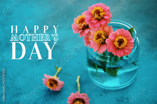 Happy Mother's day card graphic with zinnia flowers from garden in vase.