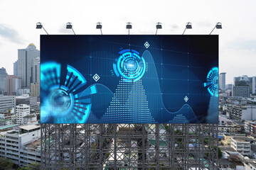Technology hologram on billboard over panorama city view of Bangkok. The largest tech hub in Southeast Asia. The concept of developing coding and high-tech science.
