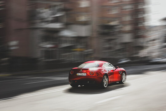 Kiev, Ukraine - August 28, 2011: Red Luxury Supercar Alfa Romeo 8C Competizione In Motion