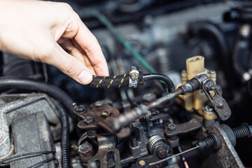 Fototapeta na wymiar check of fuel hoses of a diesel engine of a car, diagnostics.