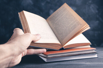 man holding books .read books