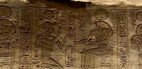 Pharaonic drawing on the wall of the Temple of Abu Simbel. in Aswan Governorate, Upper Egypt, near the border with Sudan.
