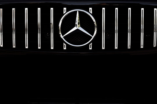 Rivne, Ukraine - August 29, 2020 : Mercedes Benz Sign Close Up Logo, Black And White Tone, Mercedes sign on the car grille G-Wagen. Close up of Mercedes car logo on a black Mercedes car.