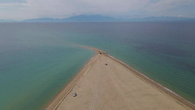 4k forward moving clip over a peninsula on  the tropical beach of Epanomi, Halkidiki, Greece