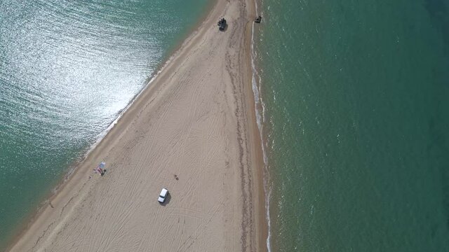 4k tilt up clip over a peninsula on the tropical beach of Epanomi, Halkidiki, Greece