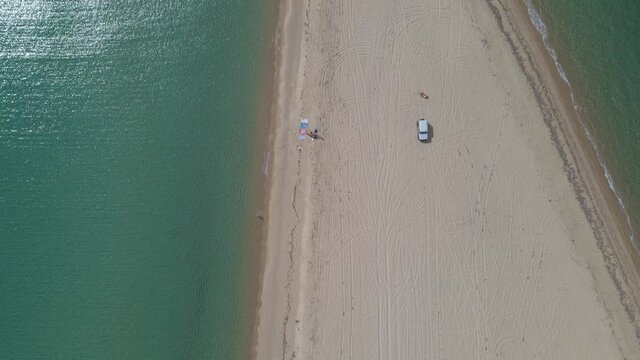 4k overhead clip over a peninsula on  the tropical beach of Epanomi, Halkidiki, Greece