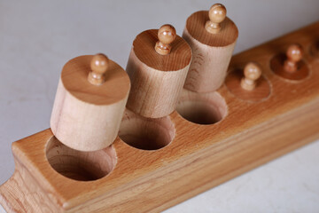 montessori sensorics cylinder block low to high and color blue box with cylinders