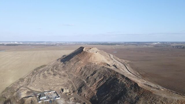 Flight over the landfill of household waste. Mothballed city dump.