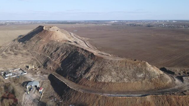 Flight over the landfill of household waste. Mothballed city dump.