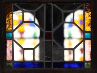 detail of sacral window on church, color stained glass, abstract concept