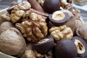 Dessert. Walnuts and hazelnuts in chocolate