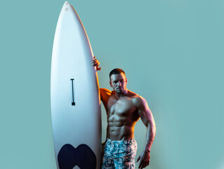 Serfer man with surfboard. Surfing hobby concept. Active lifestyle. Male beach leisure, summer...