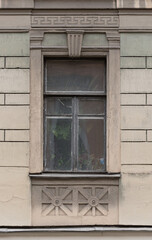  Windows in the city in the old style, with stucco, decorative elements