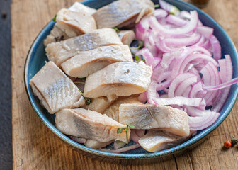 fresh herring salad slice fish salty seafood appetizer on the table pescetarian meal top view copy...