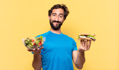 young crazy bearded athlete happy expression and diet concept
