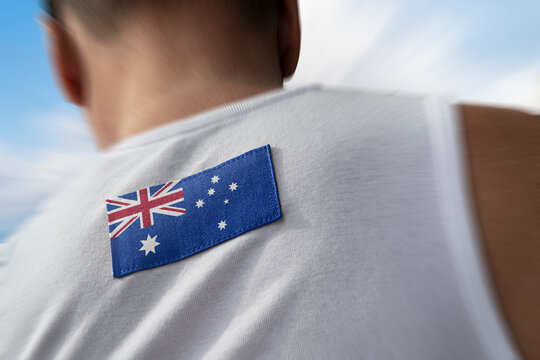 The national flag of Australia on the athlete's back - Powered by Adobe