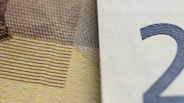 Tracking macro elements on the euro banknote. Euro banknote background.
